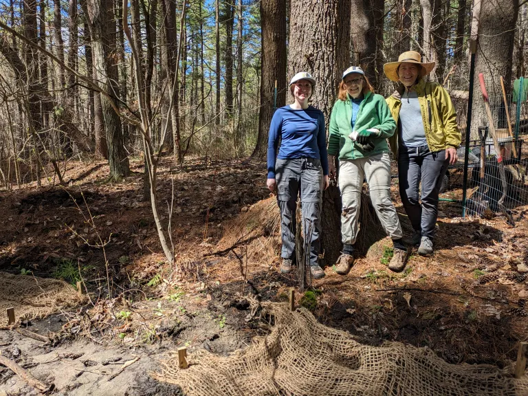 Elise Brown, Margo McMahon, and Shelley Trucksis volunteered to add the plantings and restore the stream bank.