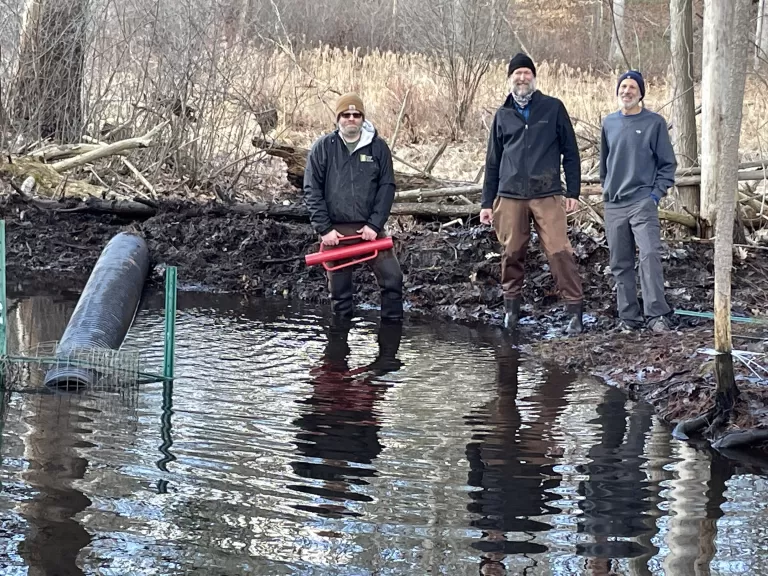 Installing a Water Flow Device at Upper Mill Brook. Photo by Carole Hohl.