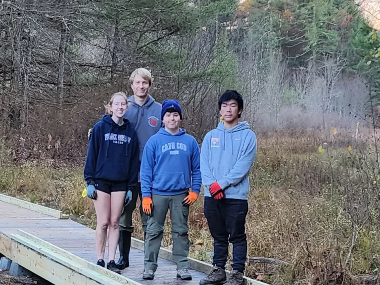 Dylan Zickus (second from left) and some of the volunteers he recruited to help build the bridge. Photo by Don Zickus.