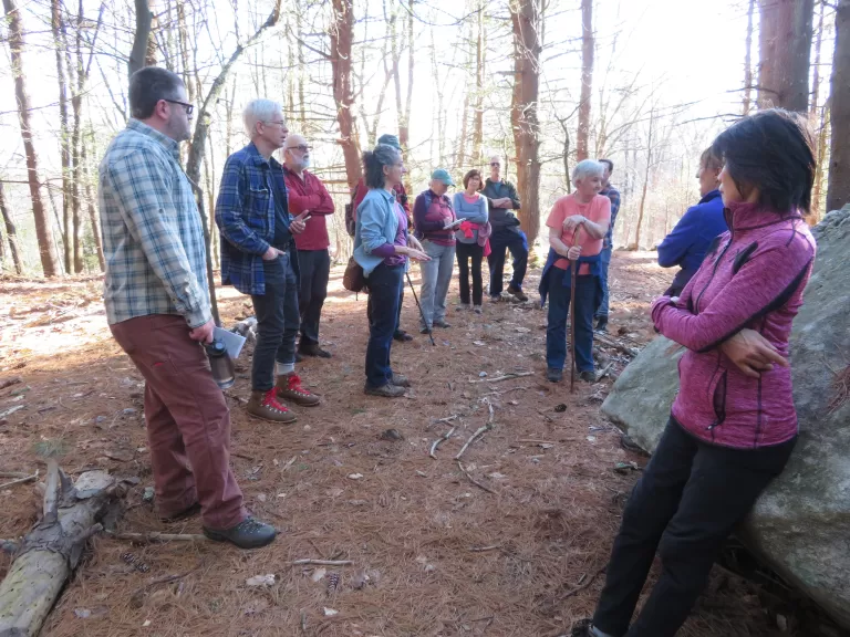 The walkers paused along the trail to discuss the wonderful wildlife habitat at Smith Conservation Land. Photo by Rick Findlay.