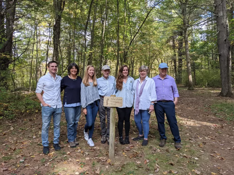 The family of Marylynn Gentry gathered at the sign marking the trail named in her honor.