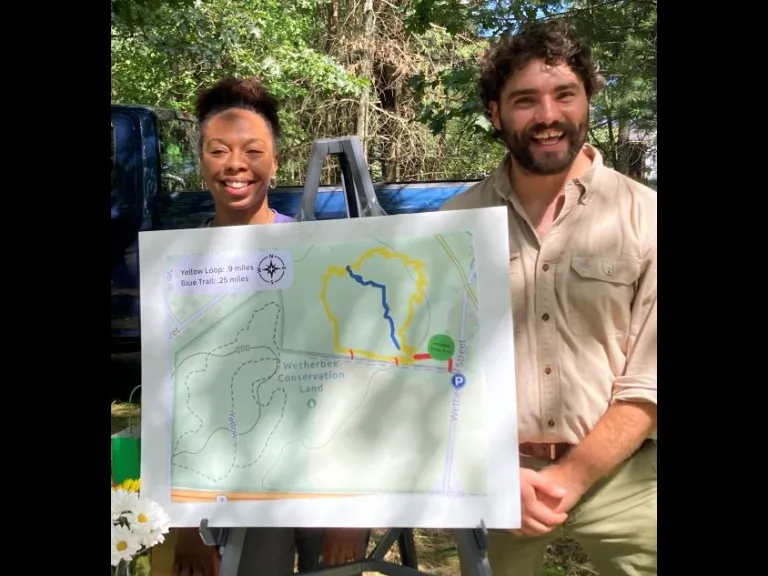The Town of Acton's Olivia Barksdale and Ian Bergemann showed off the new Moritz trail map.