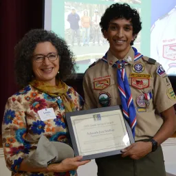 Laura Mattei presents the 2023 Youth Steward Award to Ashwath Jose Sridhar